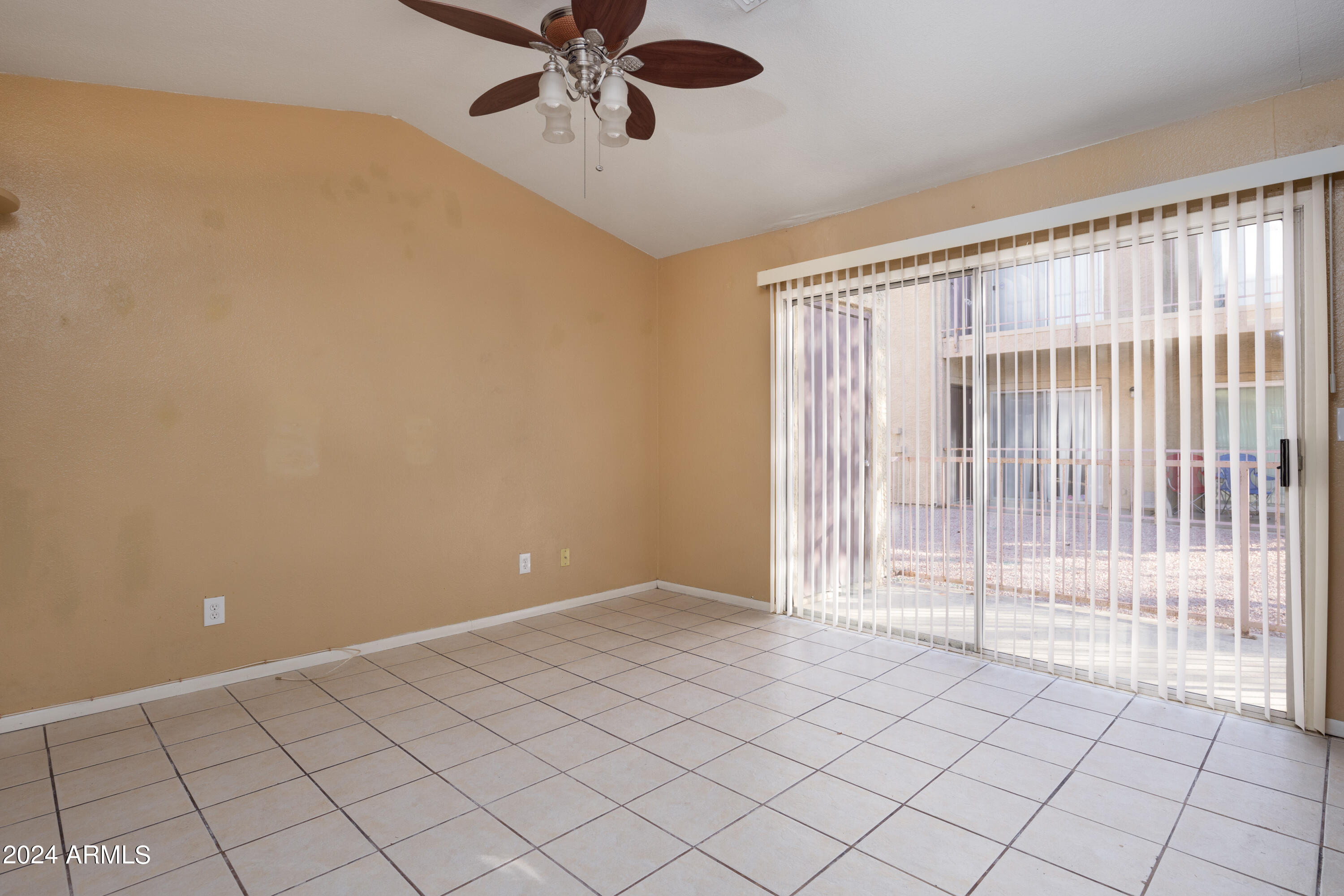 653 West Guadalupe Road, Unit 1121 Mesa, AZ 85210 - Photo 6 of 27 a view of an empty room and window