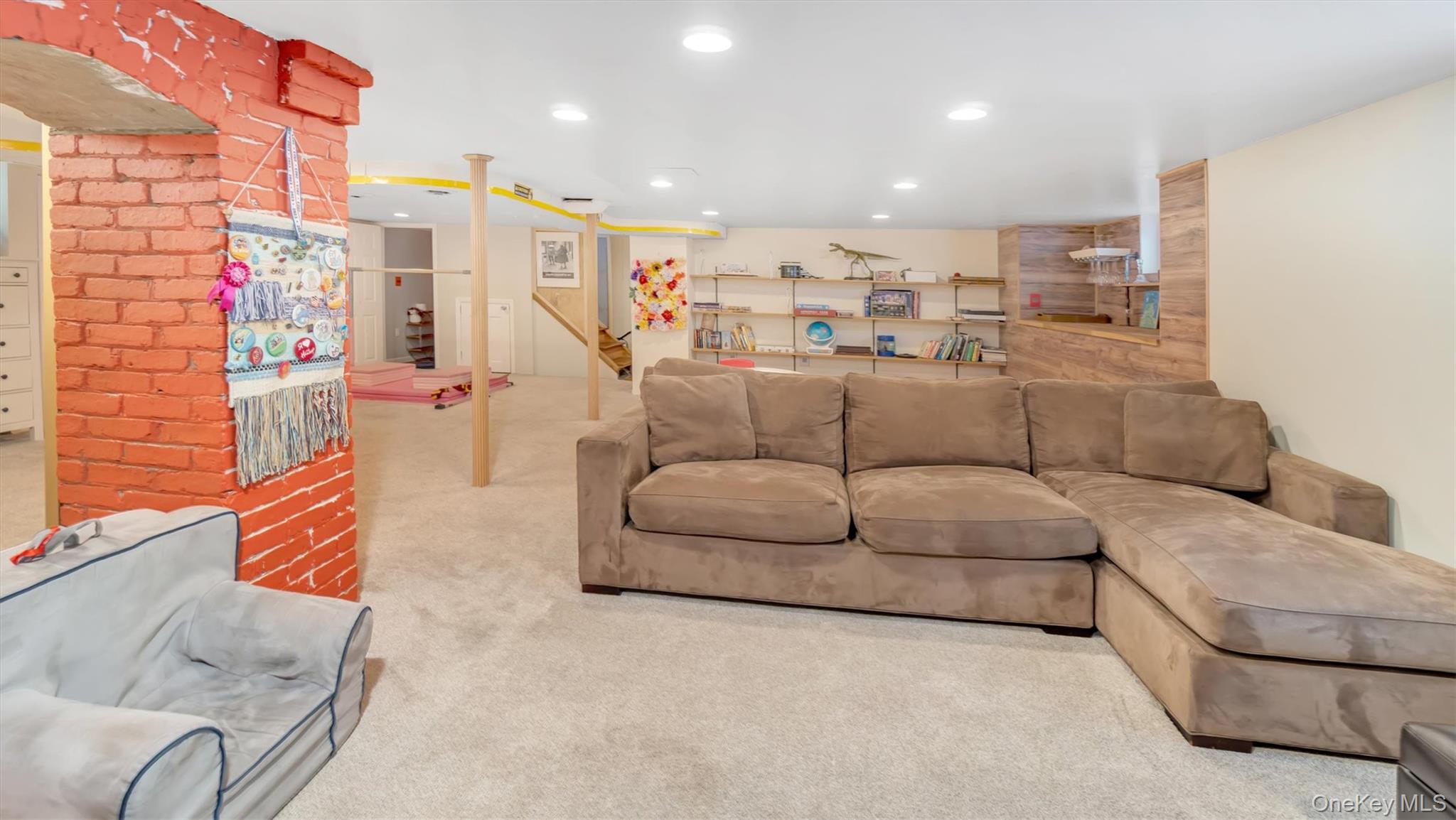 143 Hallock Street Riverhead, NY 11901 - Photo 31 of 39 a living room with furniture and kitchen view