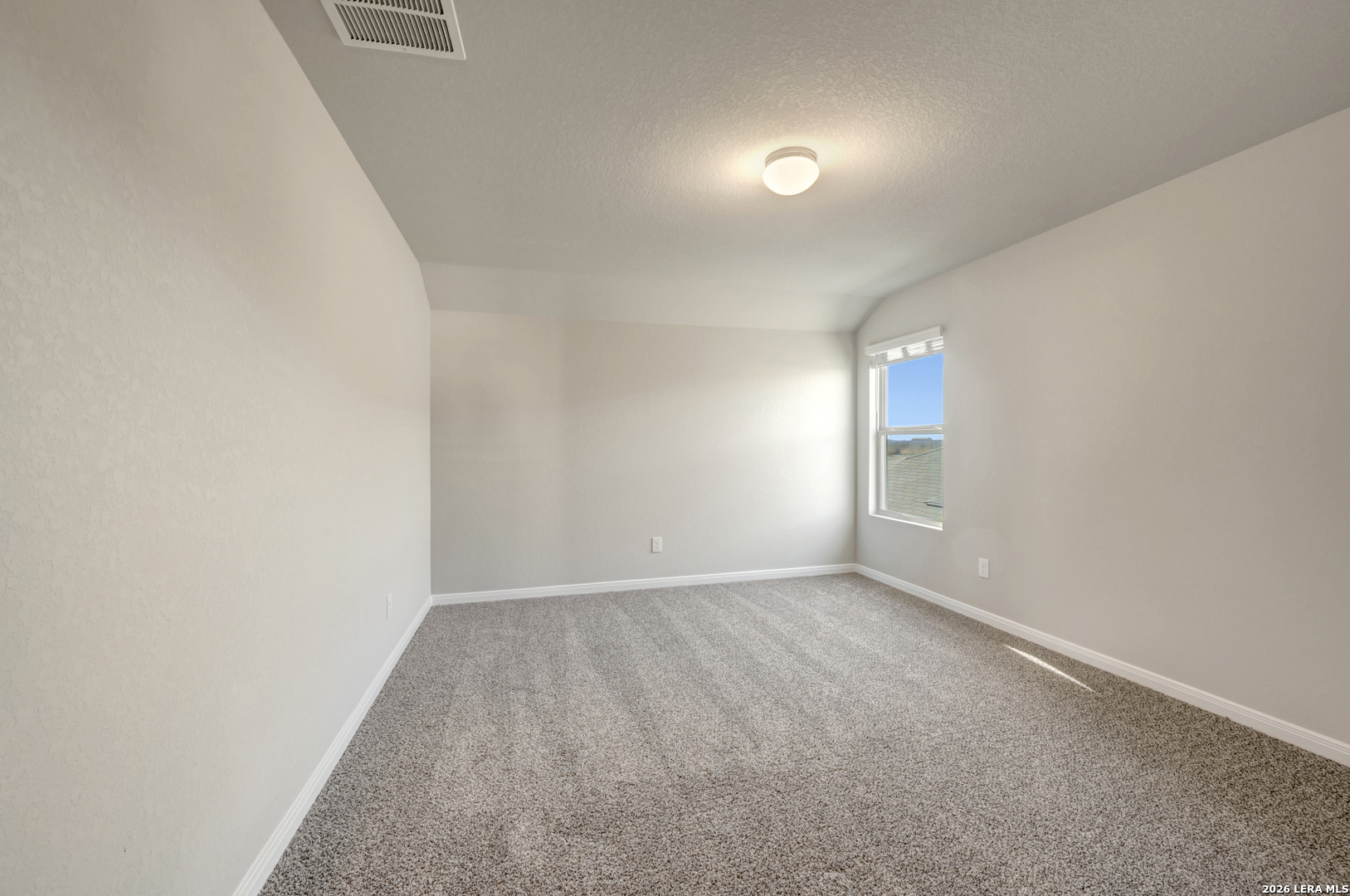 10330 Goodison Drive Converse, TX 78109 - Photo 30 of 42 an empty room with windows and closet
