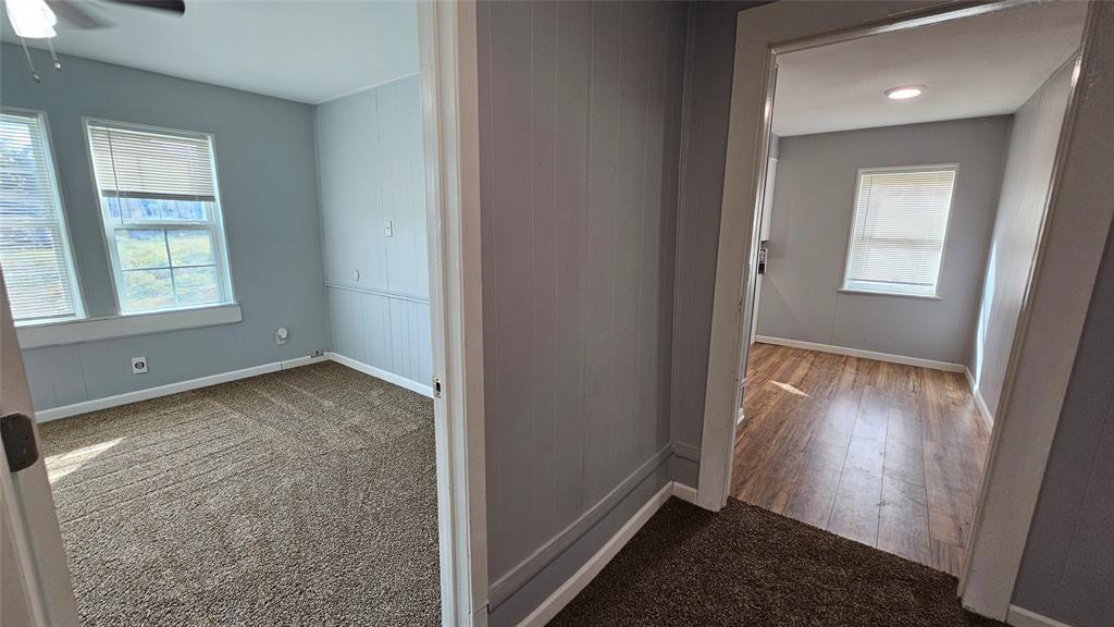 904 Duncan Street Denton, TX 76205 - Photo 14 of 40 an empty room with windows