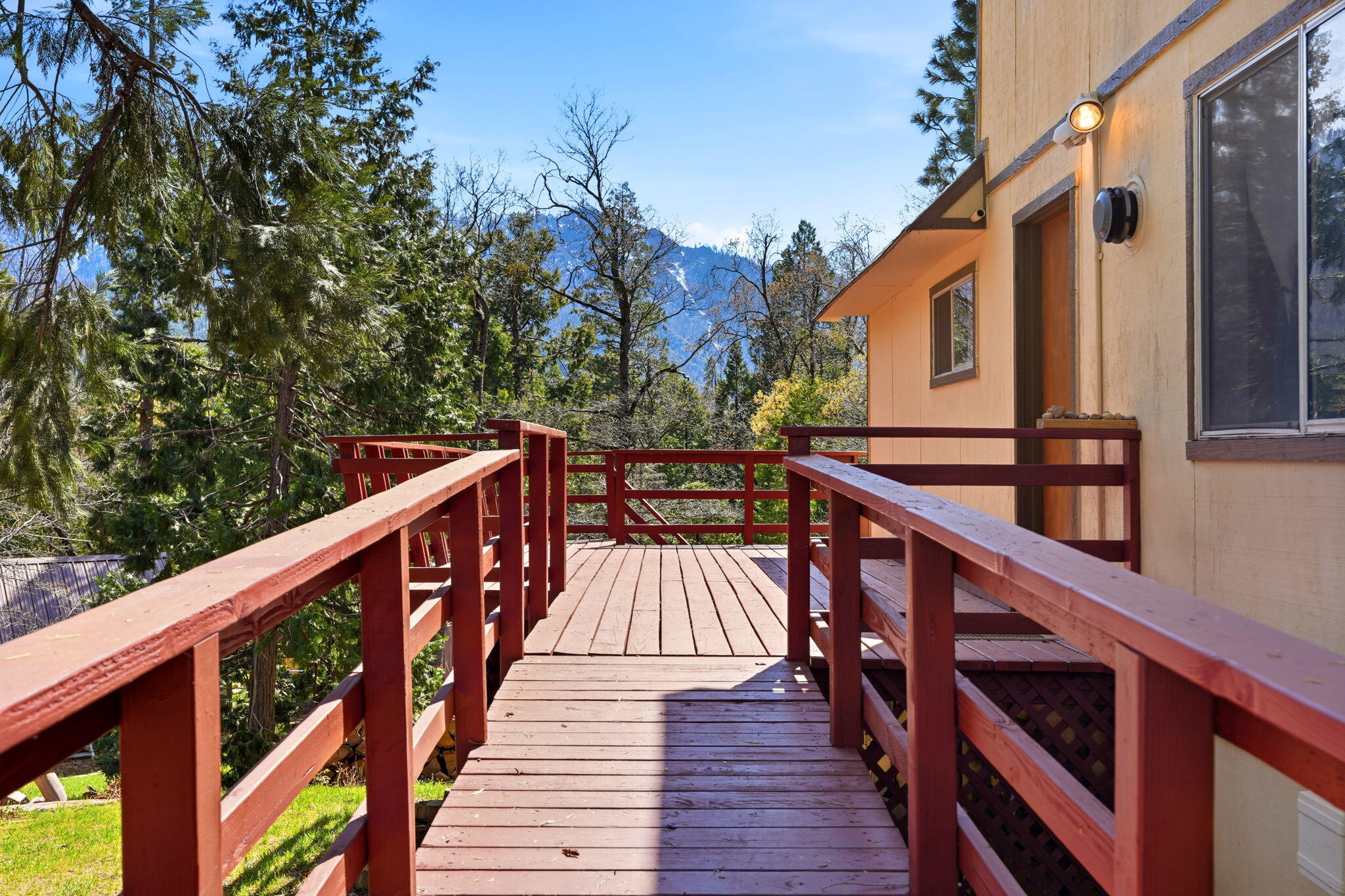 697 Loop Drive Springville, CA 93265 - Photo 3 of 55 a view of balcony with wooden floor and fence
