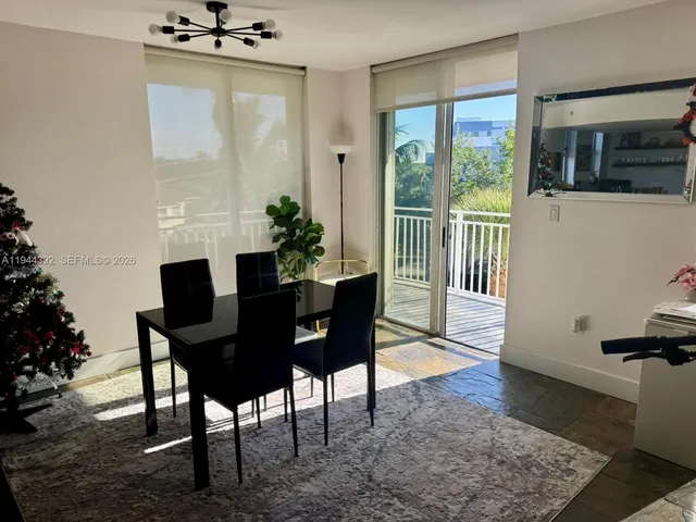 a view of balcony with wooden floor