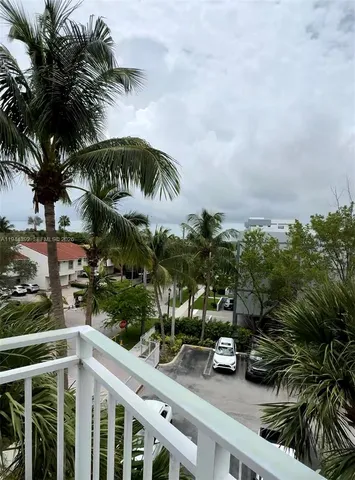 a view of a street with sitting area