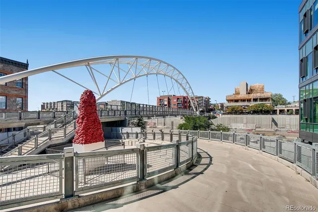 a view of roof deck with outdoor seating