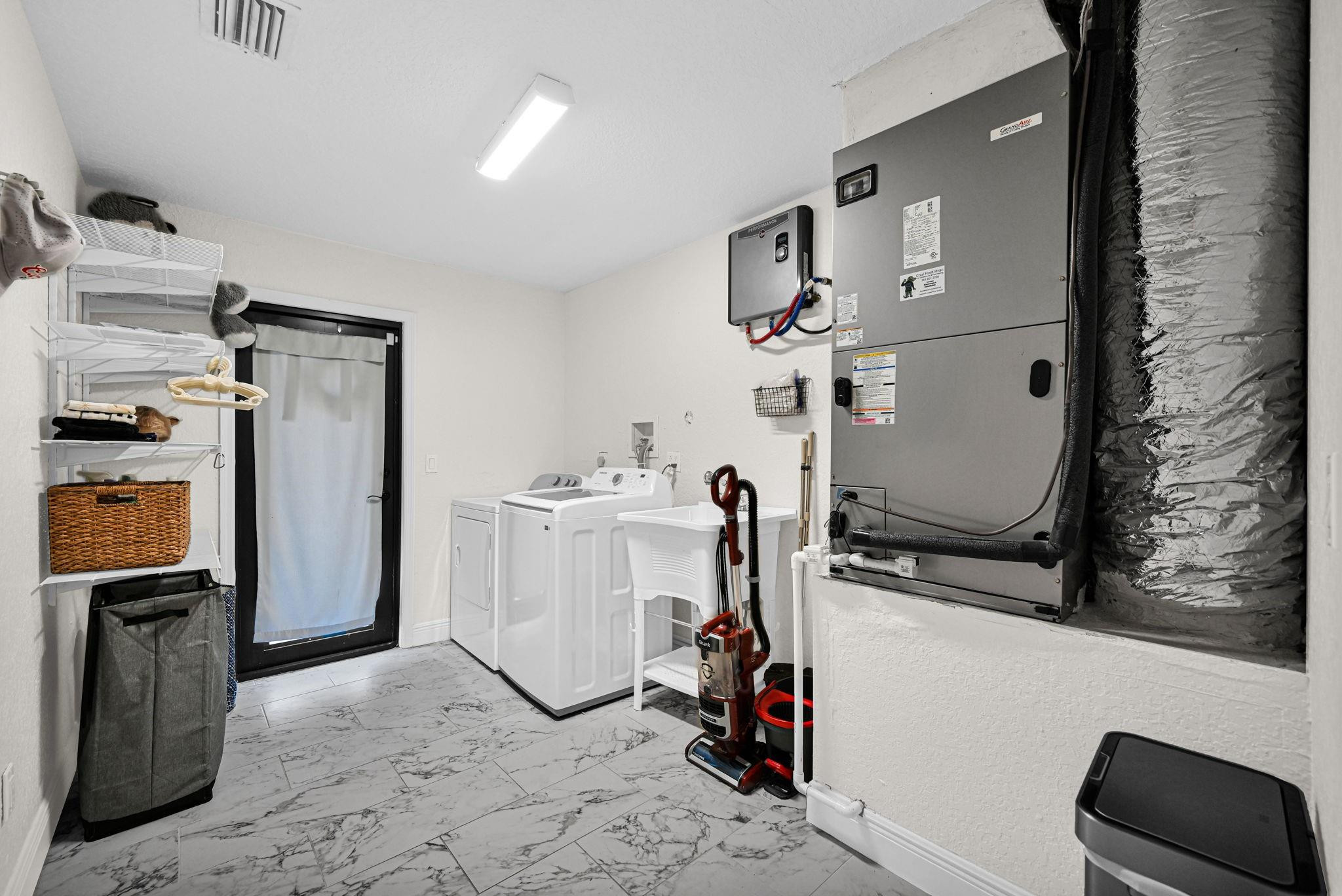 17203 40th Run North Loxahatchee, FL 33470 - Photo 22 of 58 Laundry & Utilitity Room