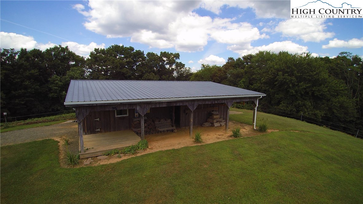 931 Graystone Road Independence, VA 24348 - Photo 26 of 32 a view of a house with backyard porch and sitting area