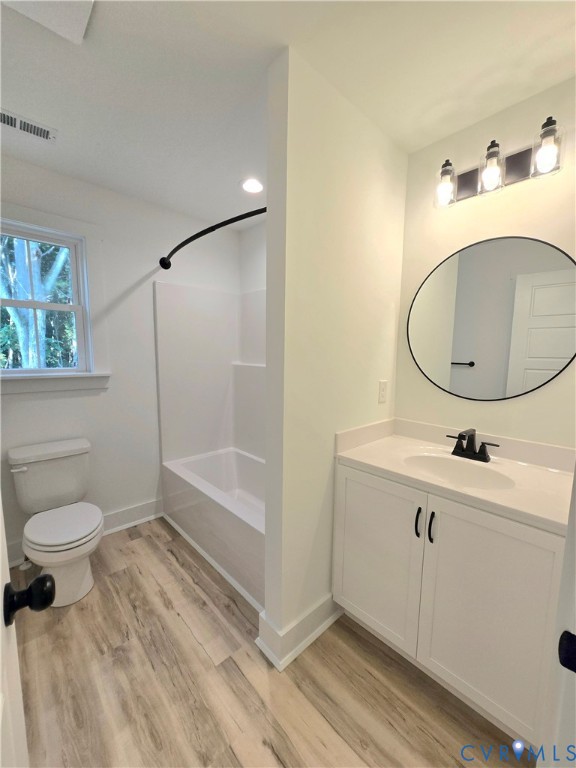 1737 Bumpass Road Bumpass, VA 23024 - Photo 16 of 26 a bathroom with a sink a toilet and shower