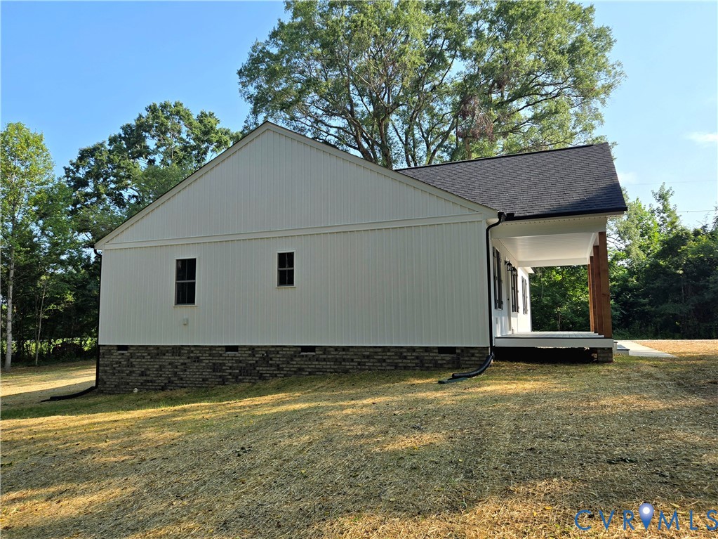 1737 Bumpass Road Bumpass, VA 23024 - Photo 2 of 26 a view of a house with a yard