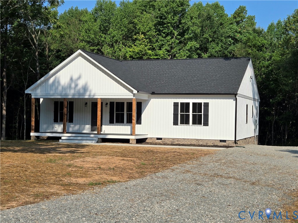 1737 Bumpass Road Bumpass, VA 23024 - Photo 3 of 26 a front view of a house with garden