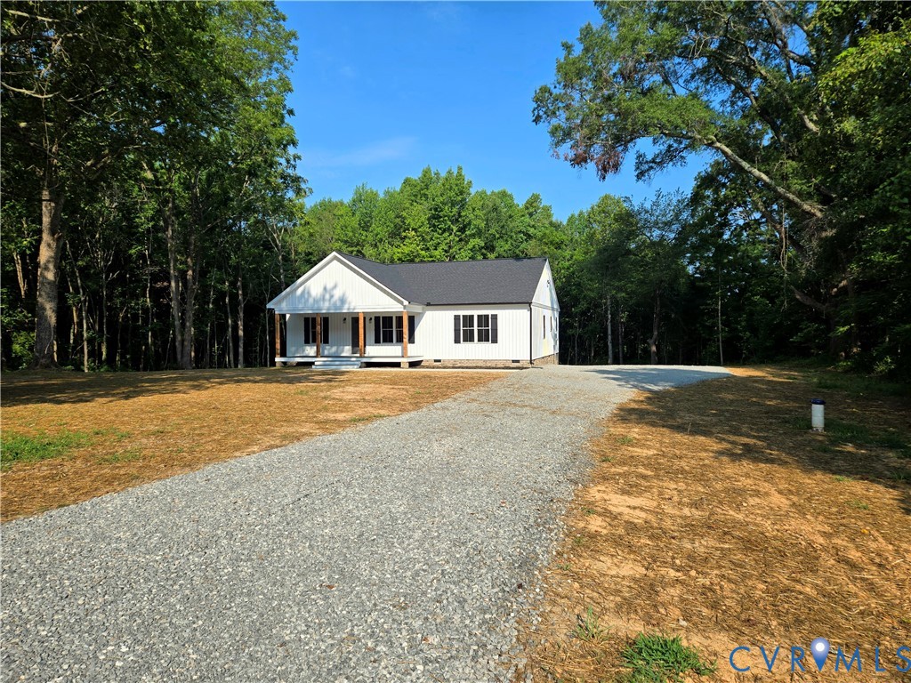 1737 Bumpass Road Bumpass, VA 23024 - Photo 8 of 26 a house with swimming pool in front of it