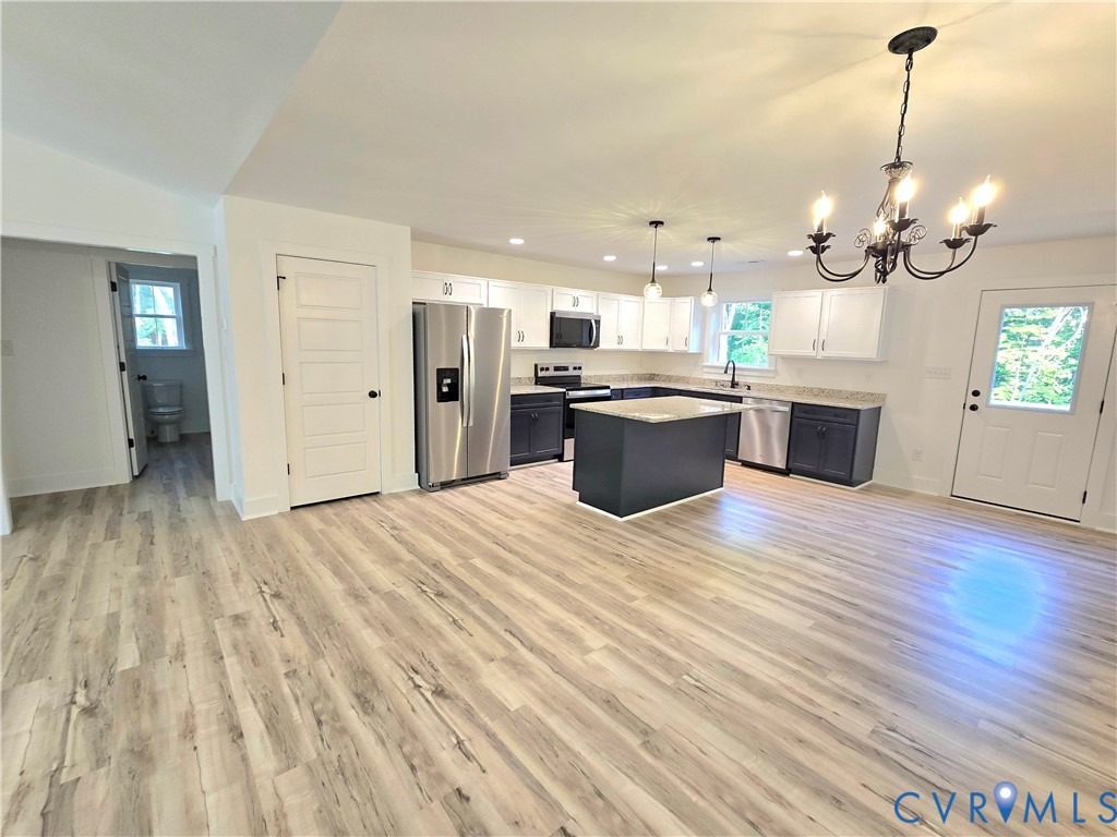 1737 Bumpass Road Bumpass, VA 23024 - Photo 9 of 26 a view of a kitchen and kitchen island