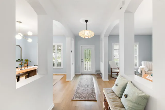 a kitchen with stainless steel appliances granite countertop a stove a refrigerator and a refrigerator