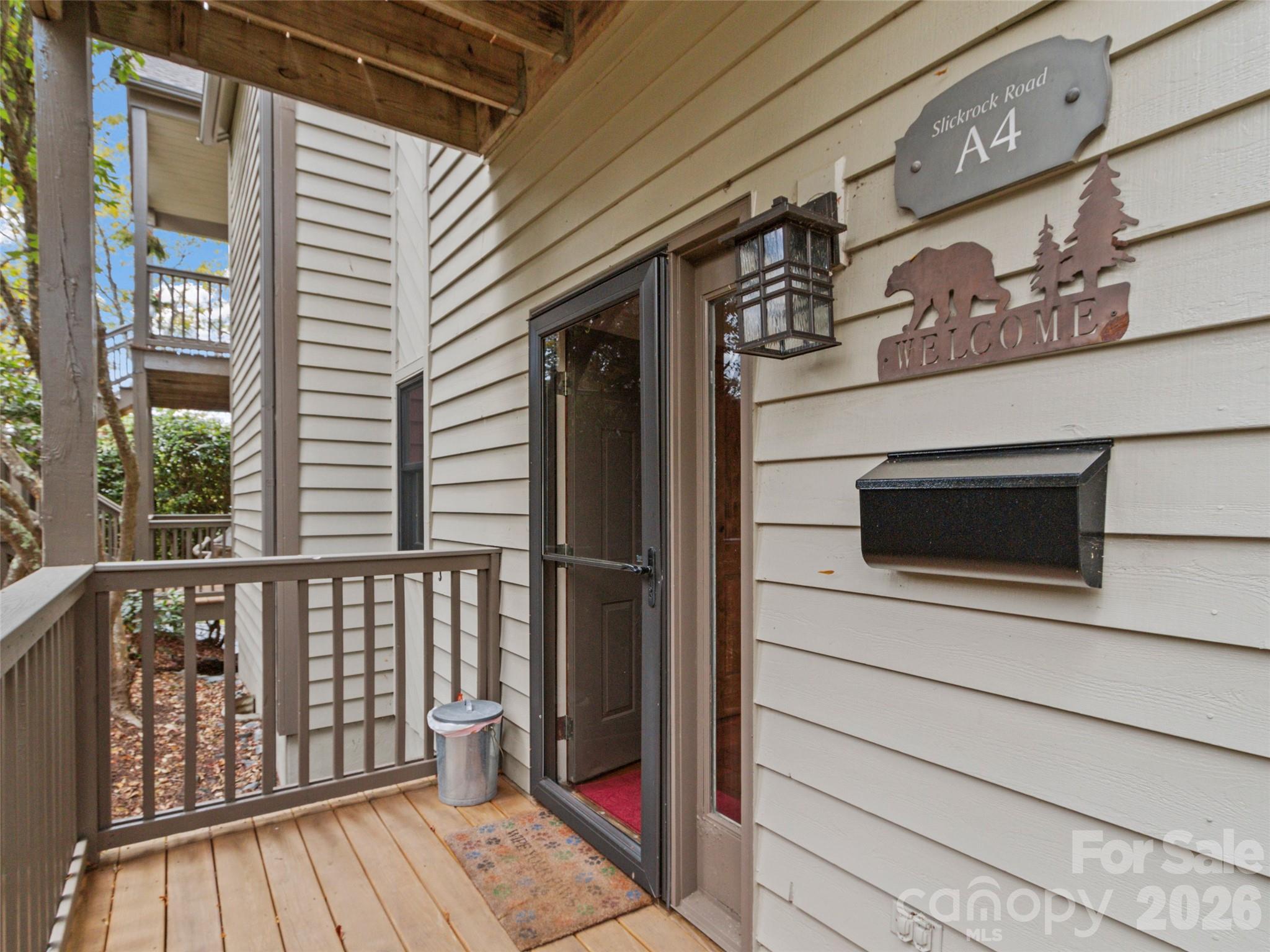 80 Slickrock Road, Unit A4 Burnsville, NC 28714 - Photo 28 of 30 a view of balcony and wooden floor
