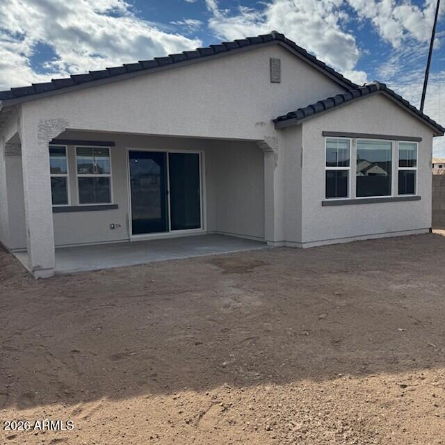 24194 West Atlantis Way Buckeye, AZ 85326 - Photo 8 of 9 a front view of a house with a yard