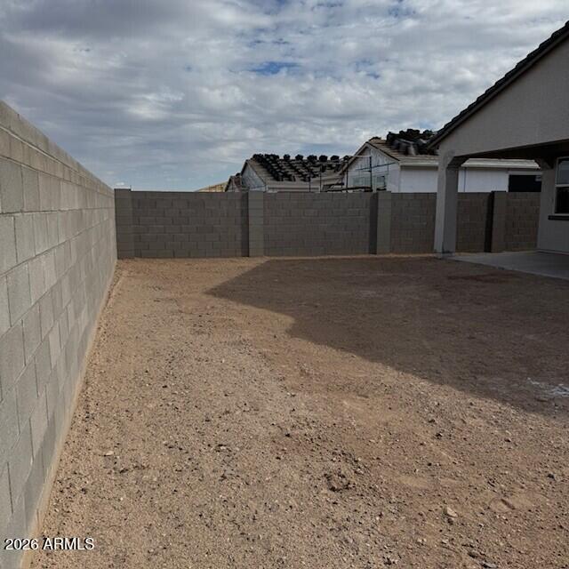 24194 West Atlantis Way Buckeye, AZ 85326 - Photo 9 of 9 a view of a parking space in front of a house