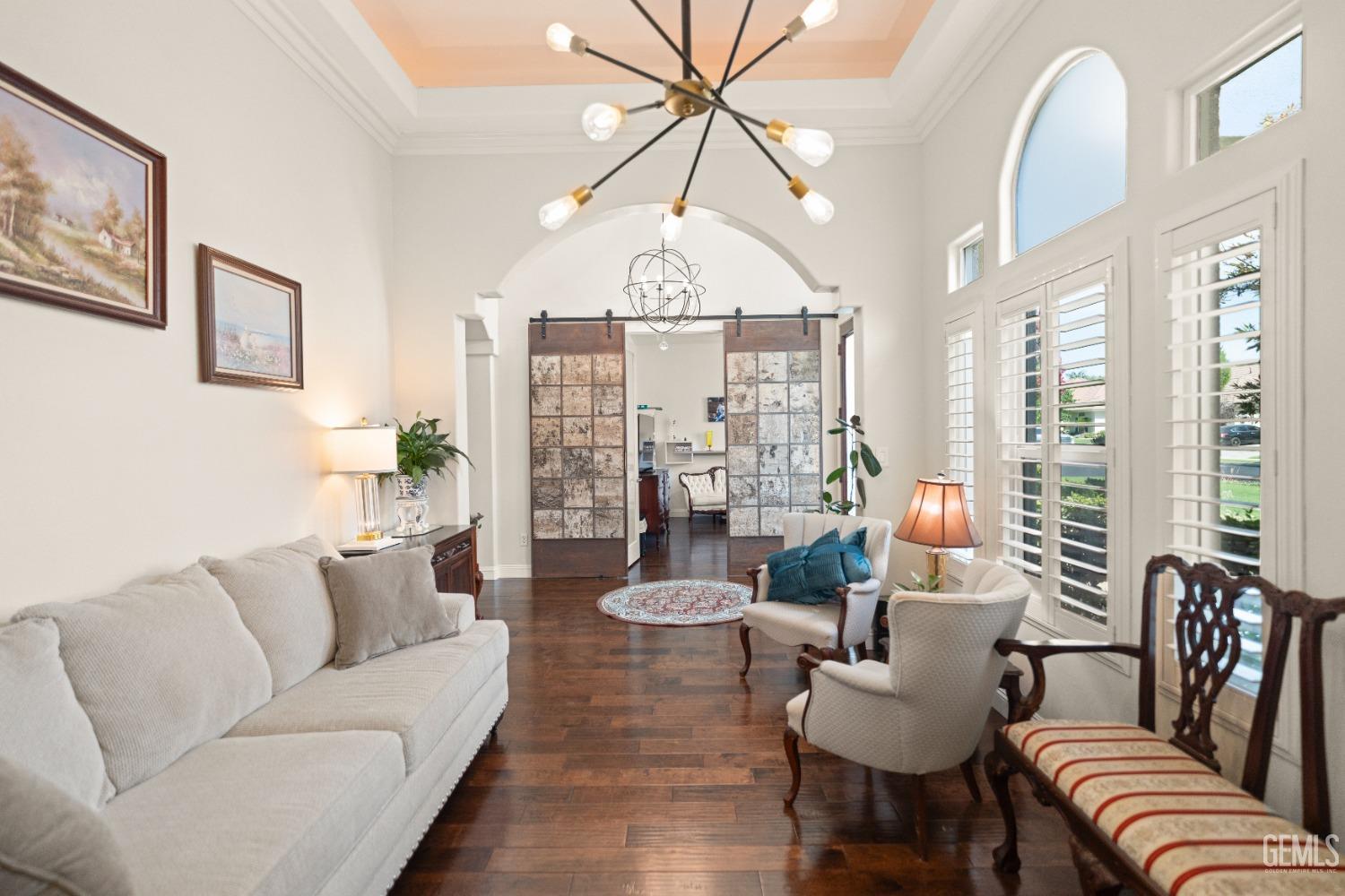 Undisclosed Address Bakersfield, CA 93311 - Photo 19 of 53 a living room with furniture and a large window