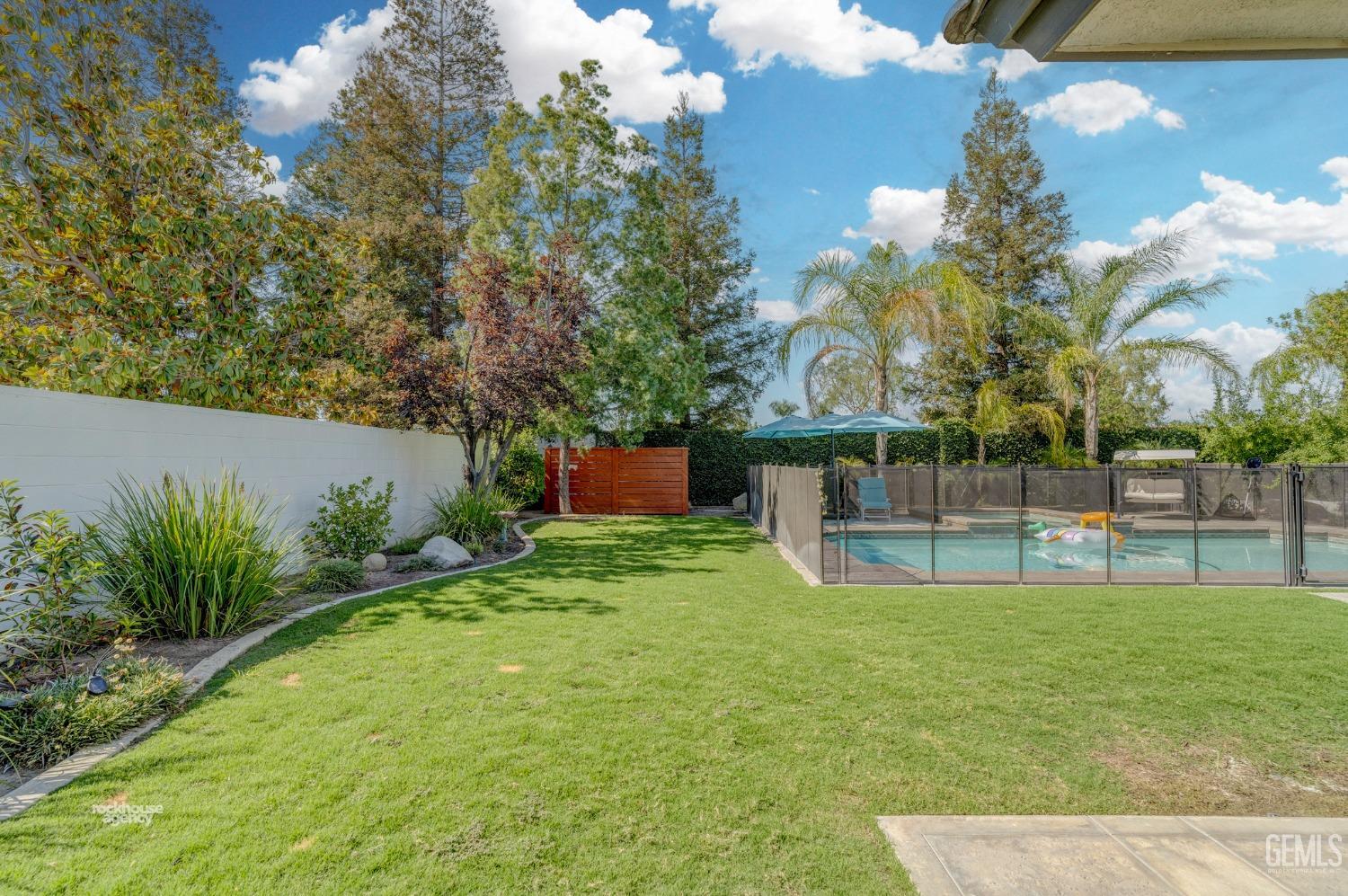 Undisclosed Address Bakersfield, CA 93311 - Photo 40 of 53 a view of a backyard