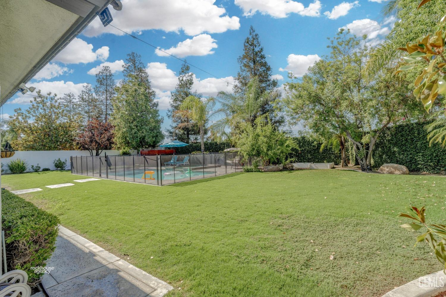 Undisclosed Address Bakersfield, CA 93311 - Photo 46 of 53 a view of a golf course with a garden