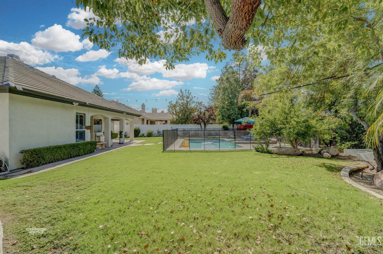 Undisclosed Address Bakersfield, CA 93311 - Photo 47 of 53 a view of a house with backyard and sitting area
