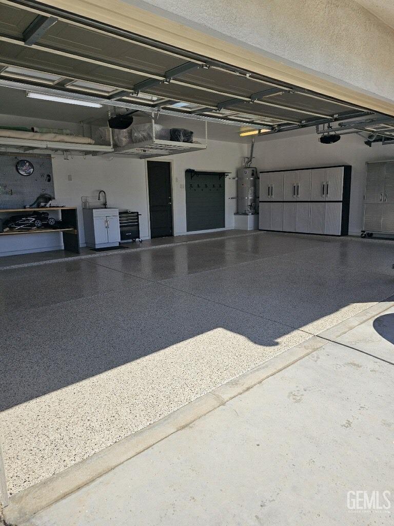 Undisclosed Address Bakersfield, CA 93311 - Photo 50 of 53 a view of a refrigerator with kitchen