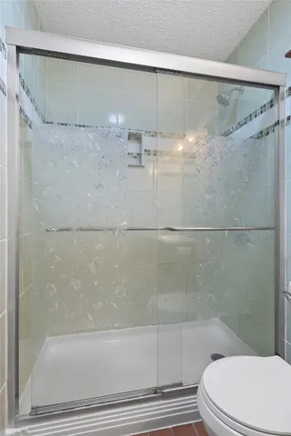 a view of a house with yard and a tree