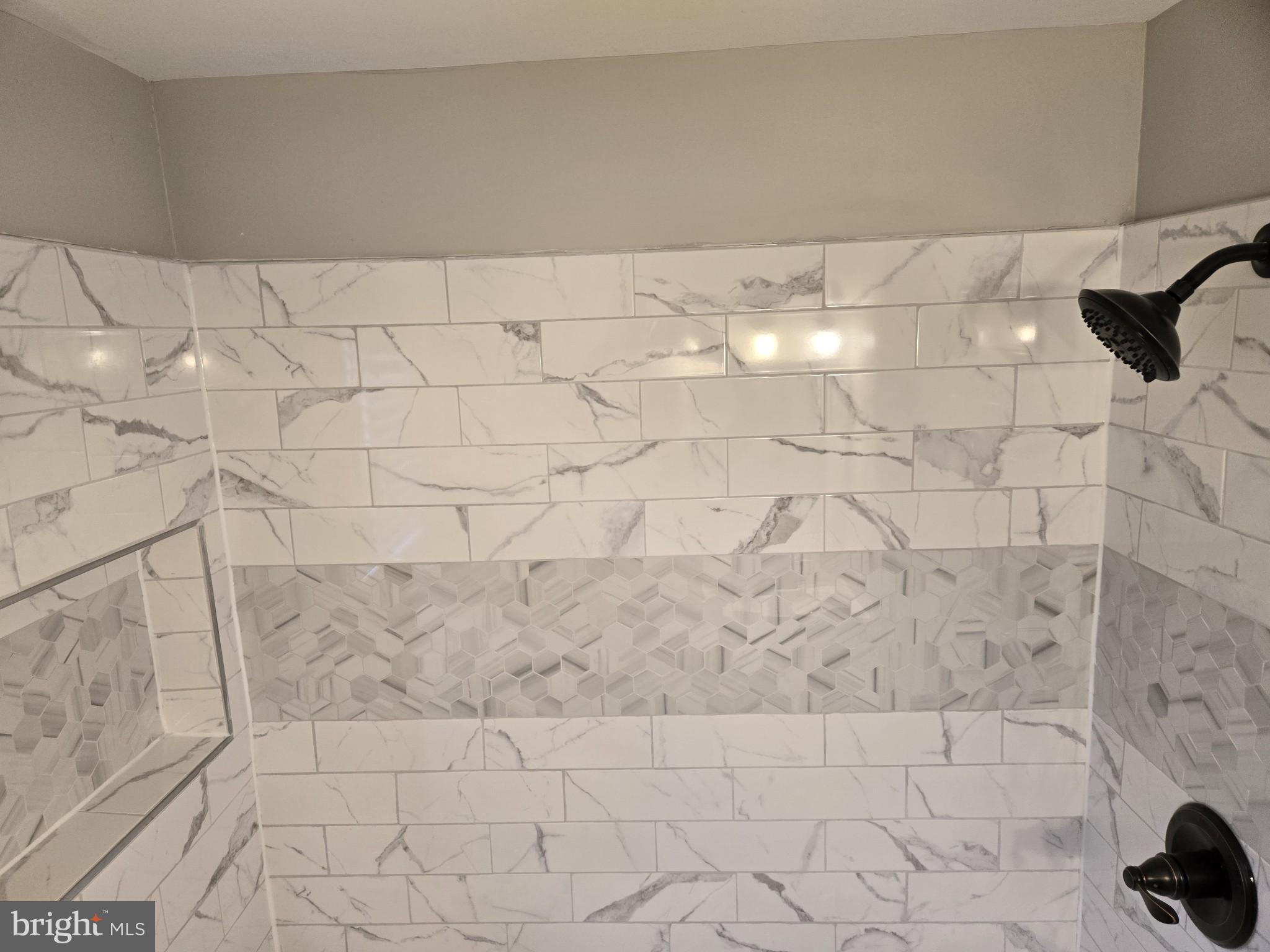 1016 Middleborough Road Essex, MD 21221 - Photo 14 of 33 a bathroom with a shower