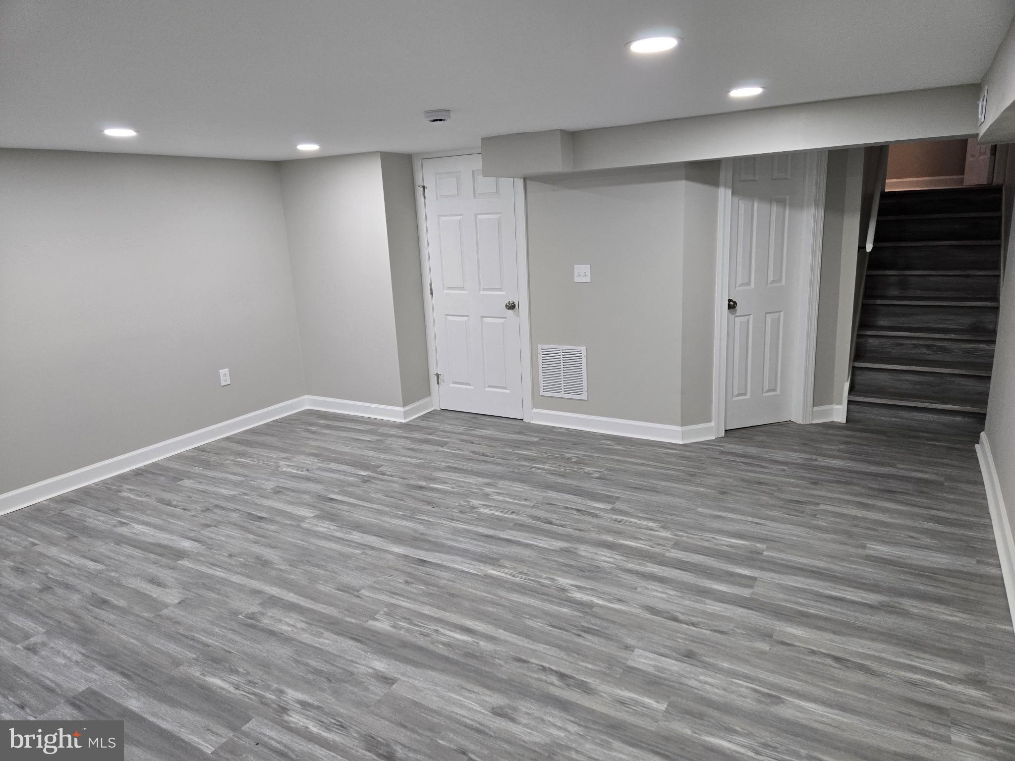 1016 Middleborough Road Essex, MD 21221 - Photo 21 of 33 an empty room with wooden floor
