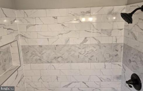 1016 Middleborough Road Essex, MD 21221 - Photo 24 of 33 a bathroom with a shower