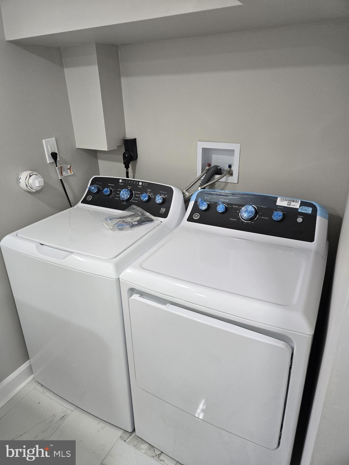 1016 Middleborough Road Essex, MD 21221 - Photo 30 of 33 a utility room with dryer and washer