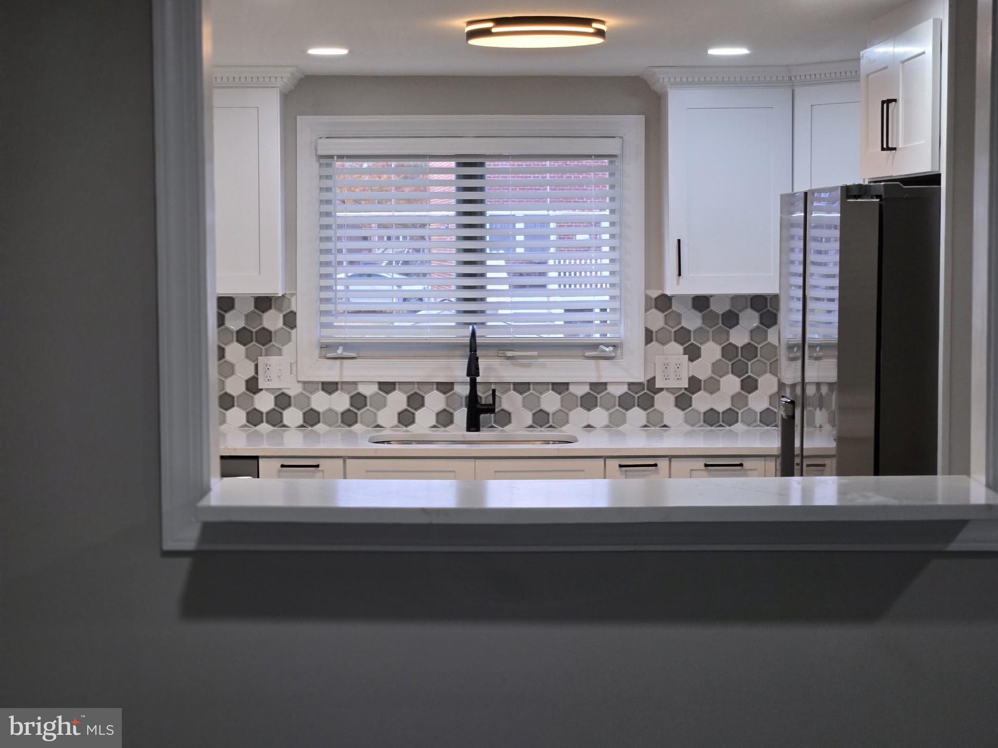 1016 Middleborough Road Essex, MD 21221 - Photo 5 of 33 a view of a kitchen from a window