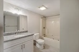 a bathroom with a shower and a toilet
