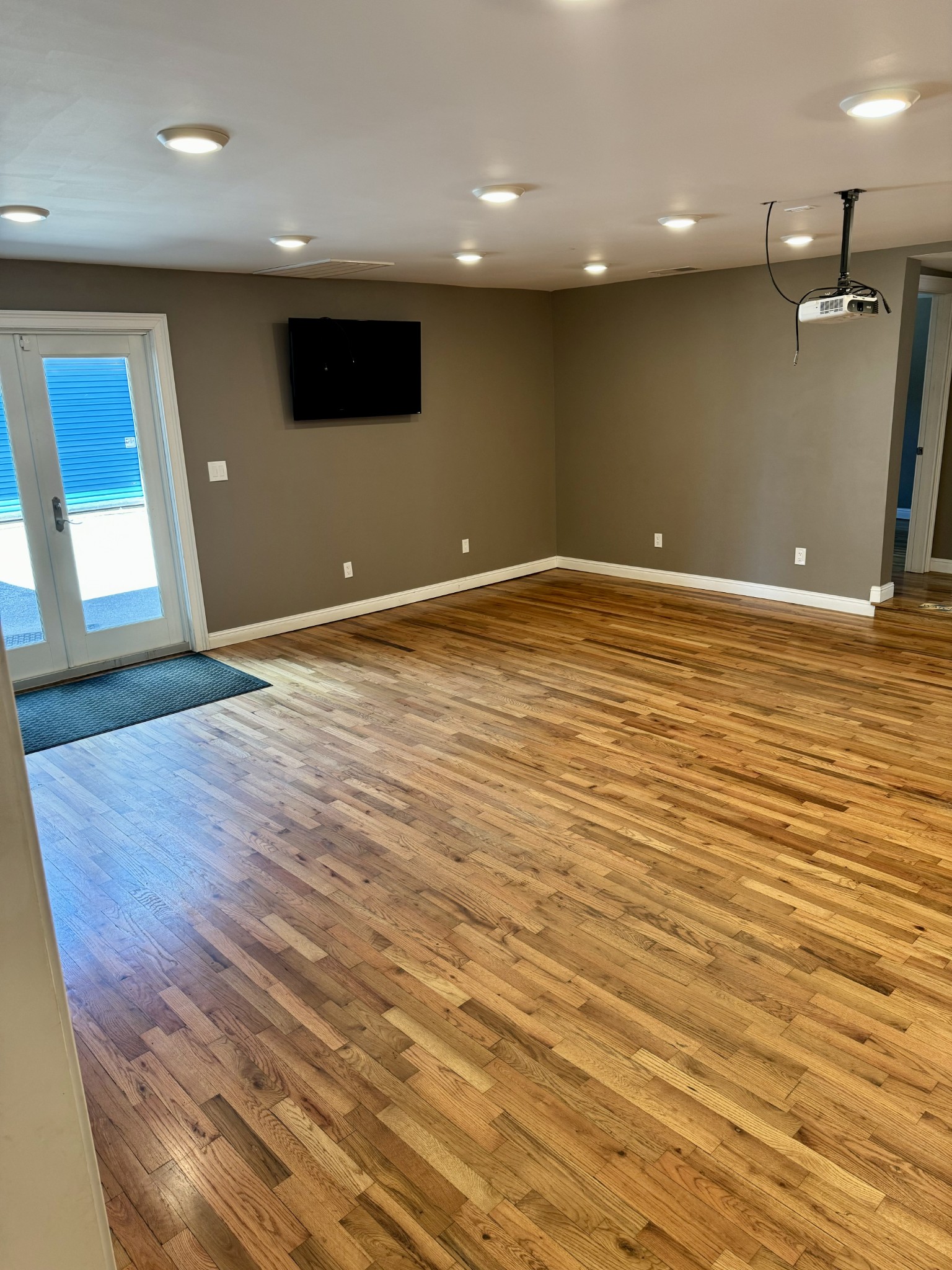 610 West Burton Street Murfreesboro, TN 37130 - Photo 13 of 32 an empty room with wooden floor and windows