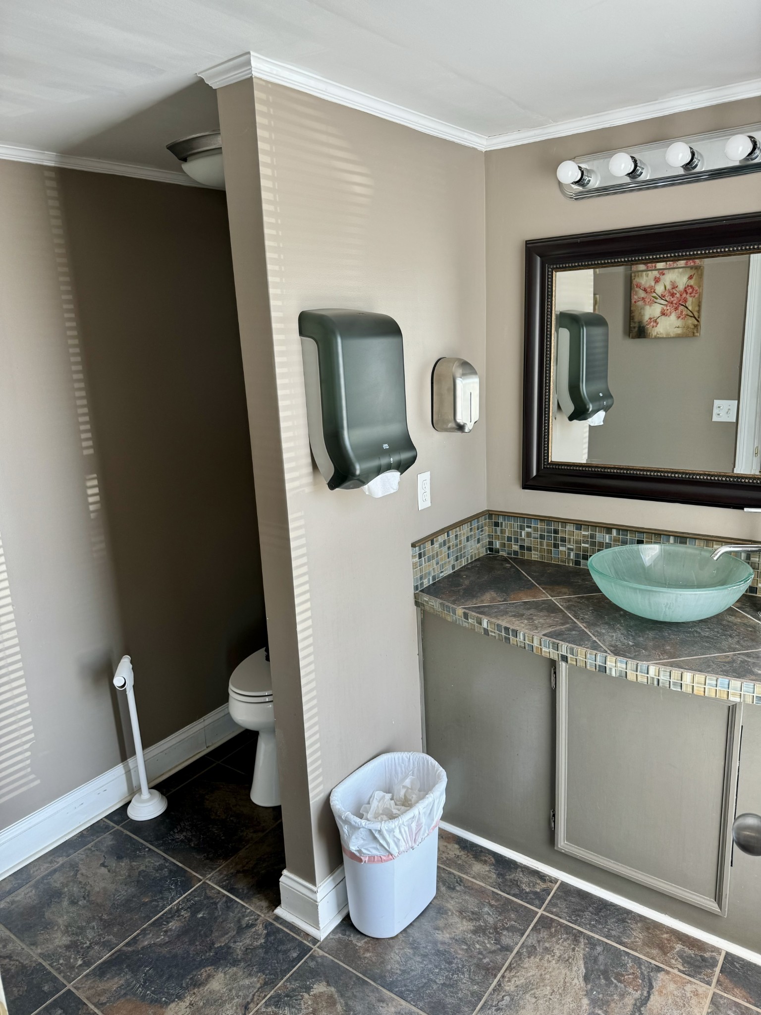 610 West Burton Street Murfreesboro, TN 37130 - Photo 16 of 32 a bathroom with a granite countertop toilet sink and mirror