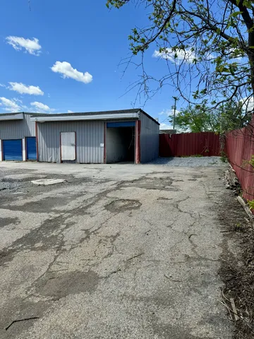 a view of a building with a street