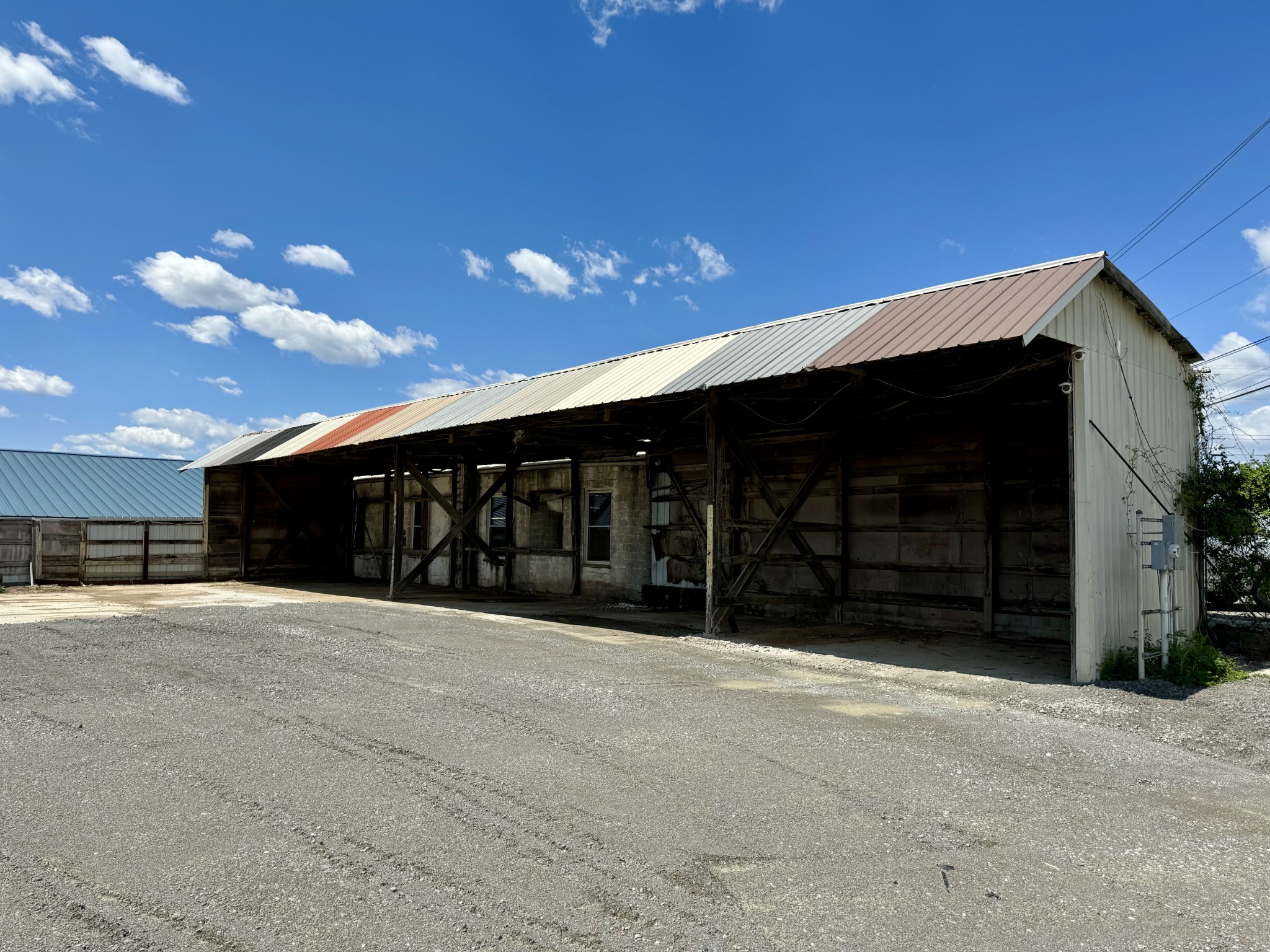 610 West Burton Street Murfreesboro, TN 37130 - Photo 31 of 32 a view of a house with a backyard