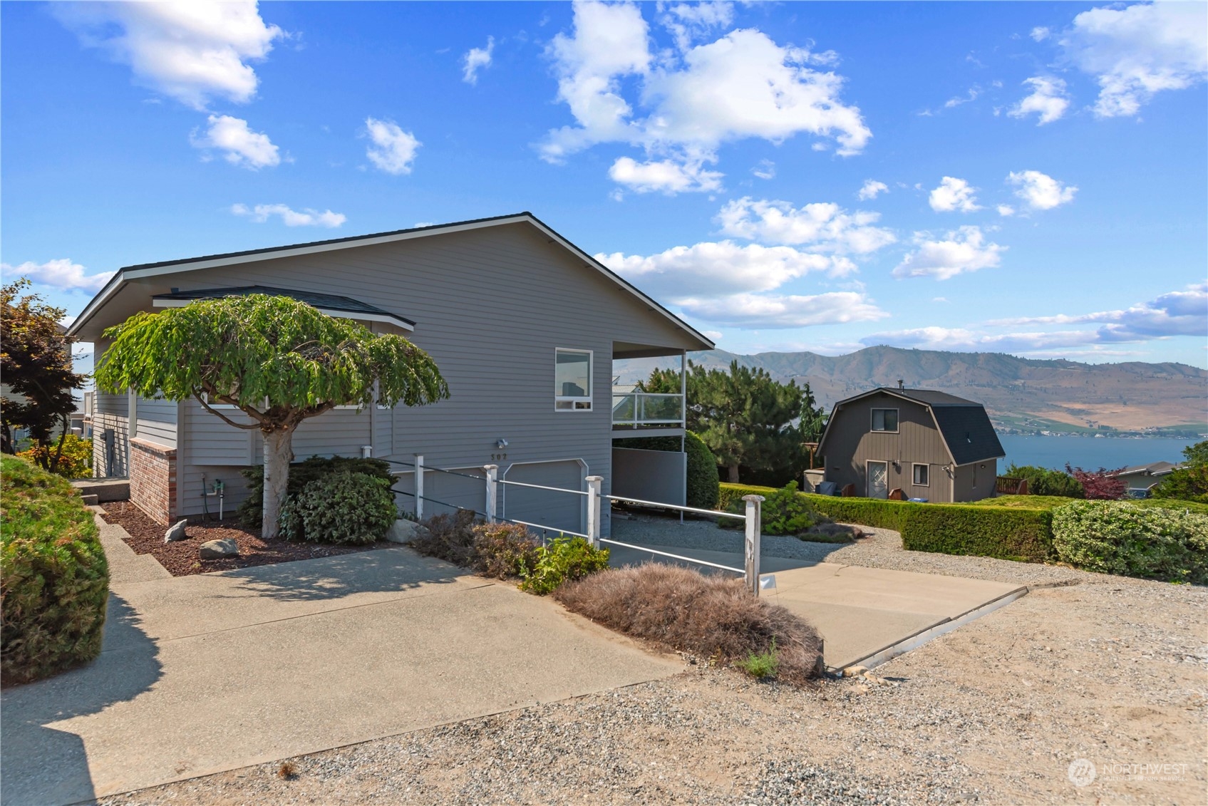 a house view with a garden space