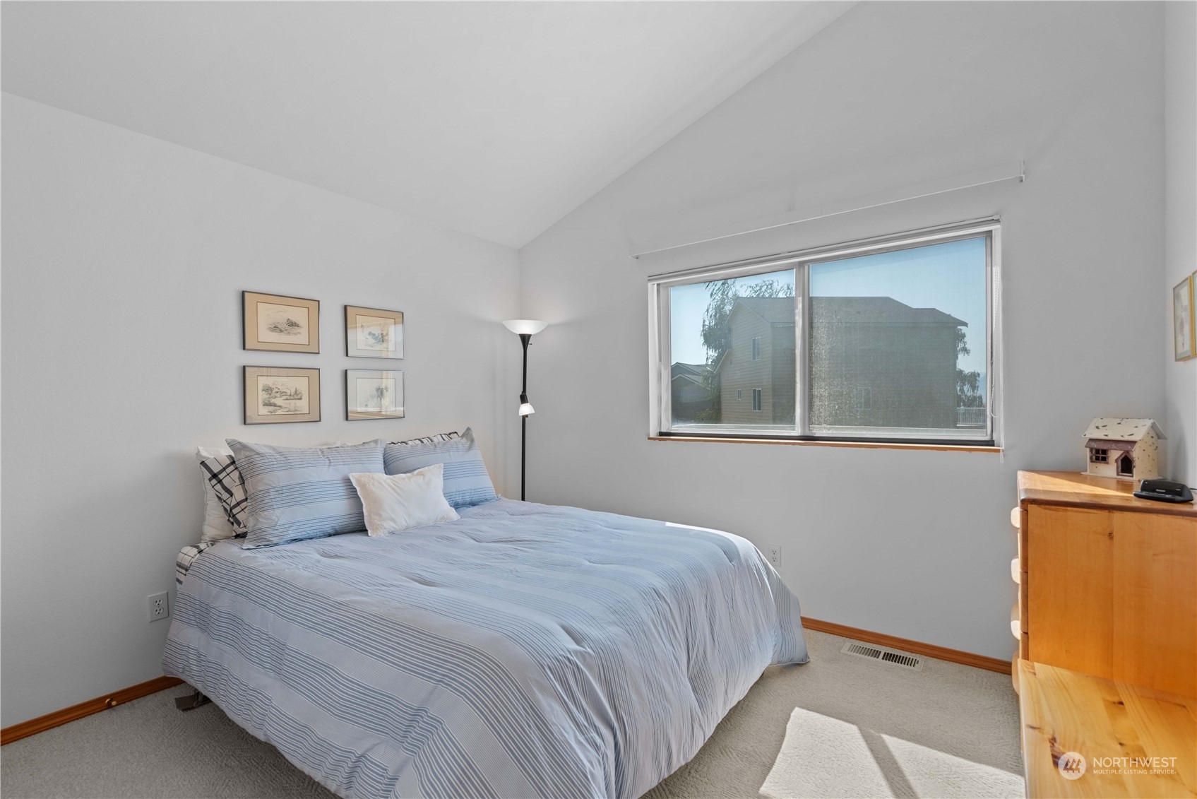 302 Butte Road Chelan, WA 98816 - Photo 16 of 35 a bedroom with a bed and a window