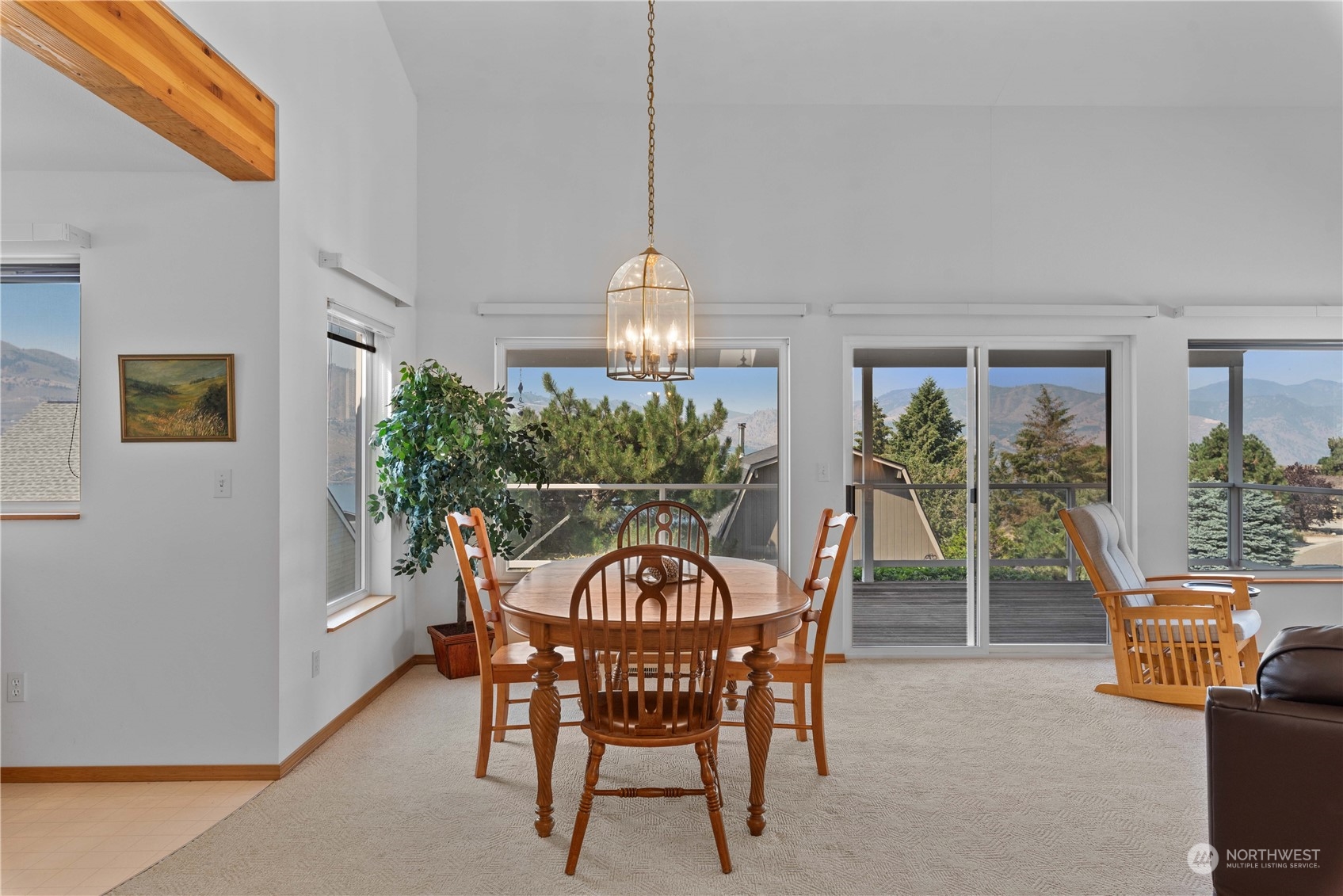 302 Butte Road Chelan, WA 98816 - Photo 5 of 35 a view of a dining room with furniture window and outside view