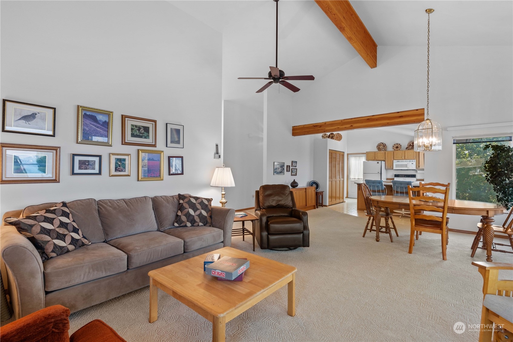 302 Butte Road Chelan, WA 98816 - Photo 7 of 35 a living room with furniture a rug and a window