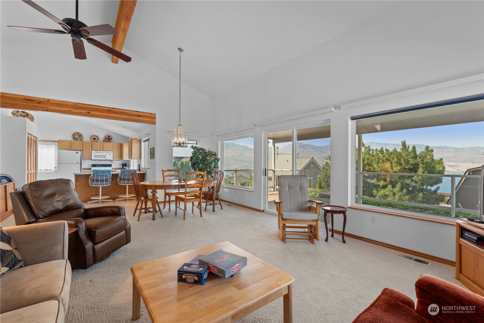 302 Butte Road Chelan, WA 98816 - Photo 8 of 35 a living room with furniture and a large window