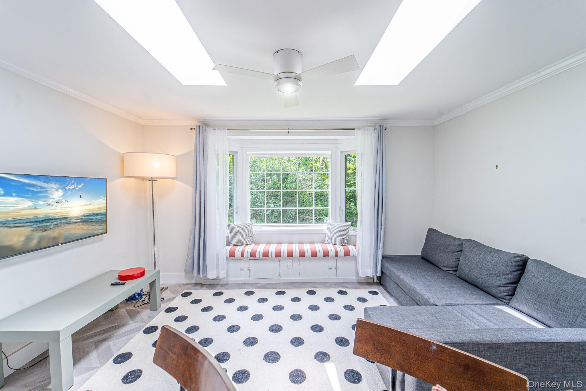9 Higgins Trail Monroe, NY 10950 - Photo 15 of 24 a living room with furniture and a flat screen tv