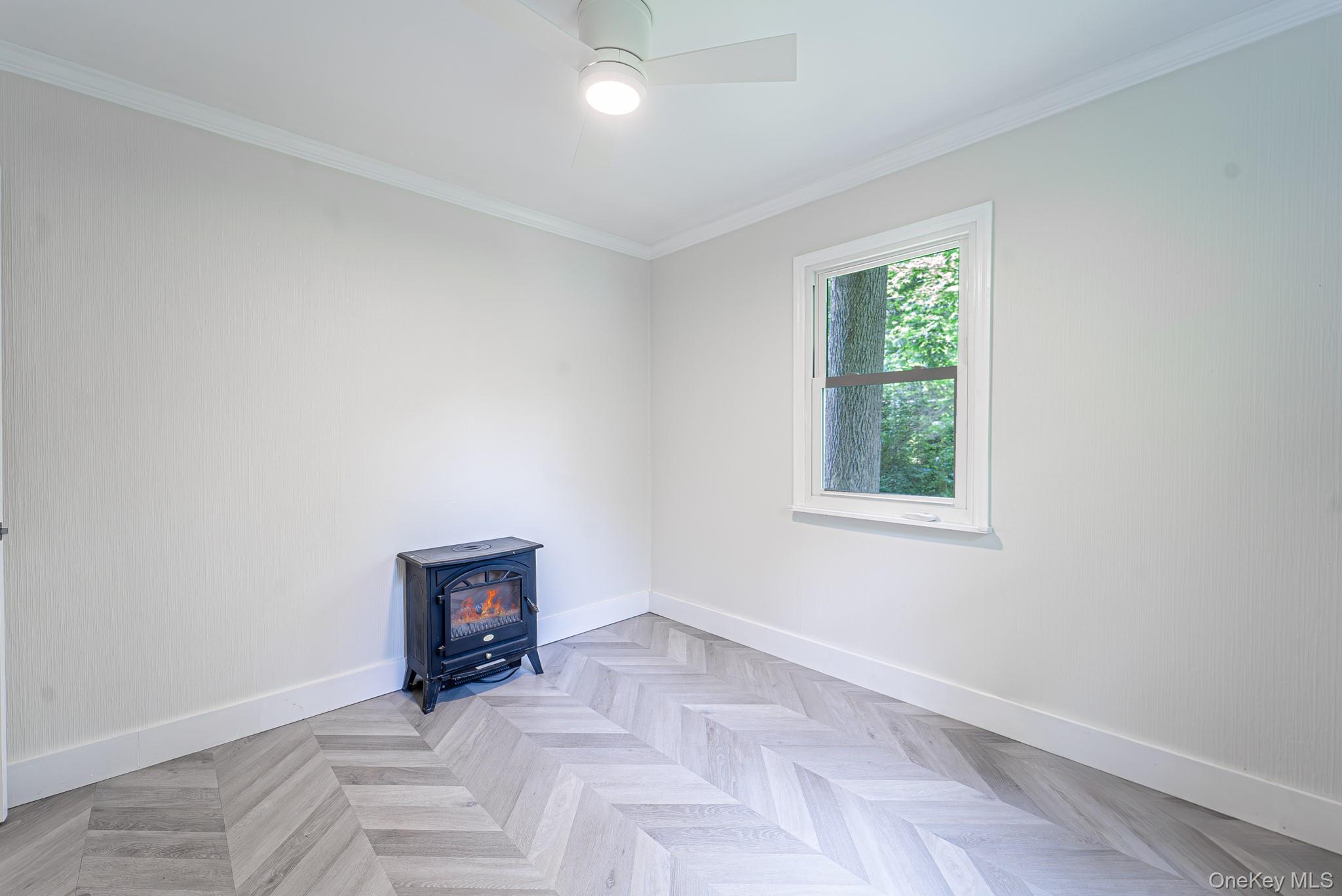 9 Higgins Trail Monroe, NY 10950 - Photo 23 of 24 an empty room with windows