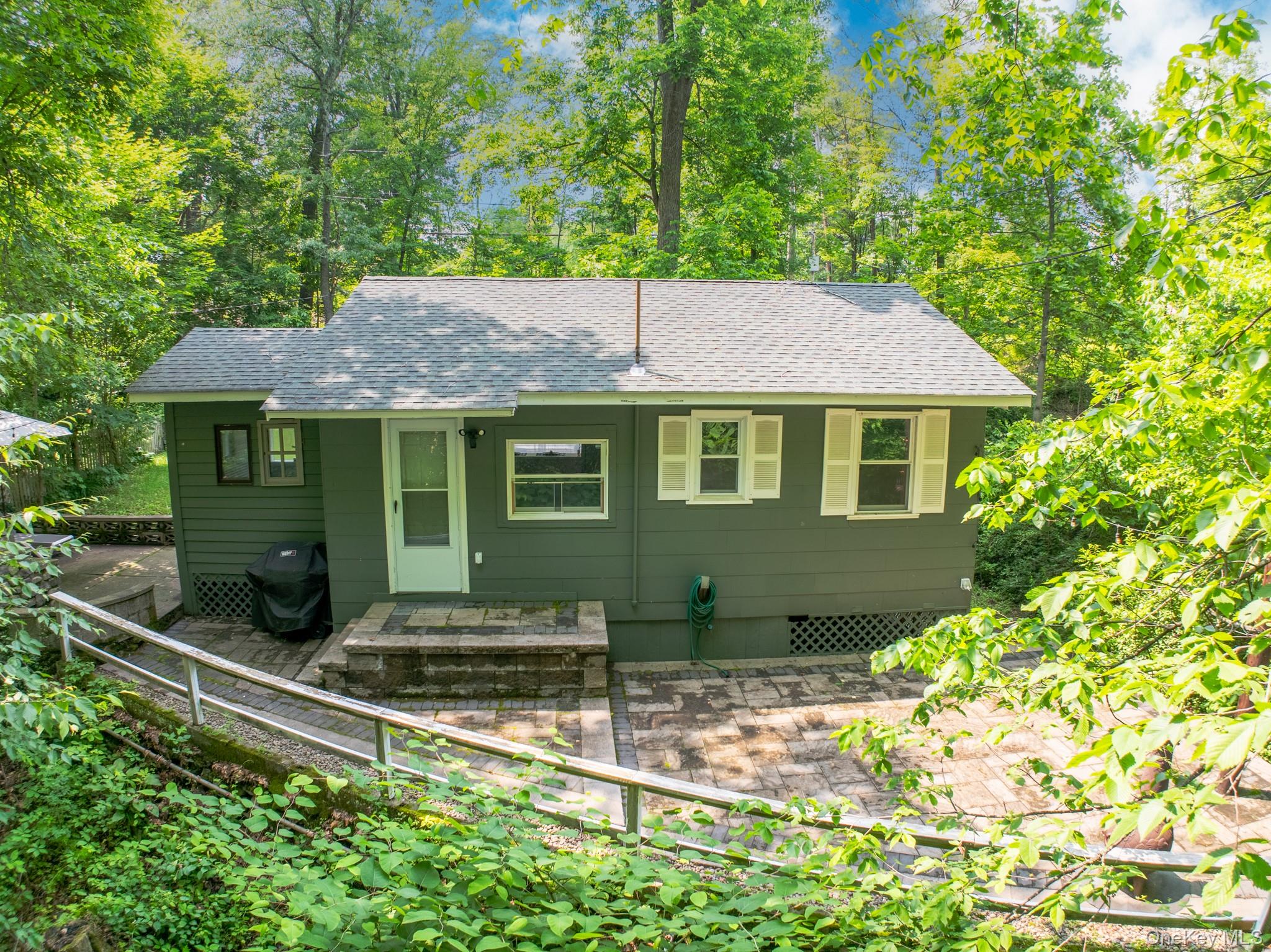 9 Higgins Trail Monroe, NY 10950 - Photo 5 of 24 a front view of a house with garden