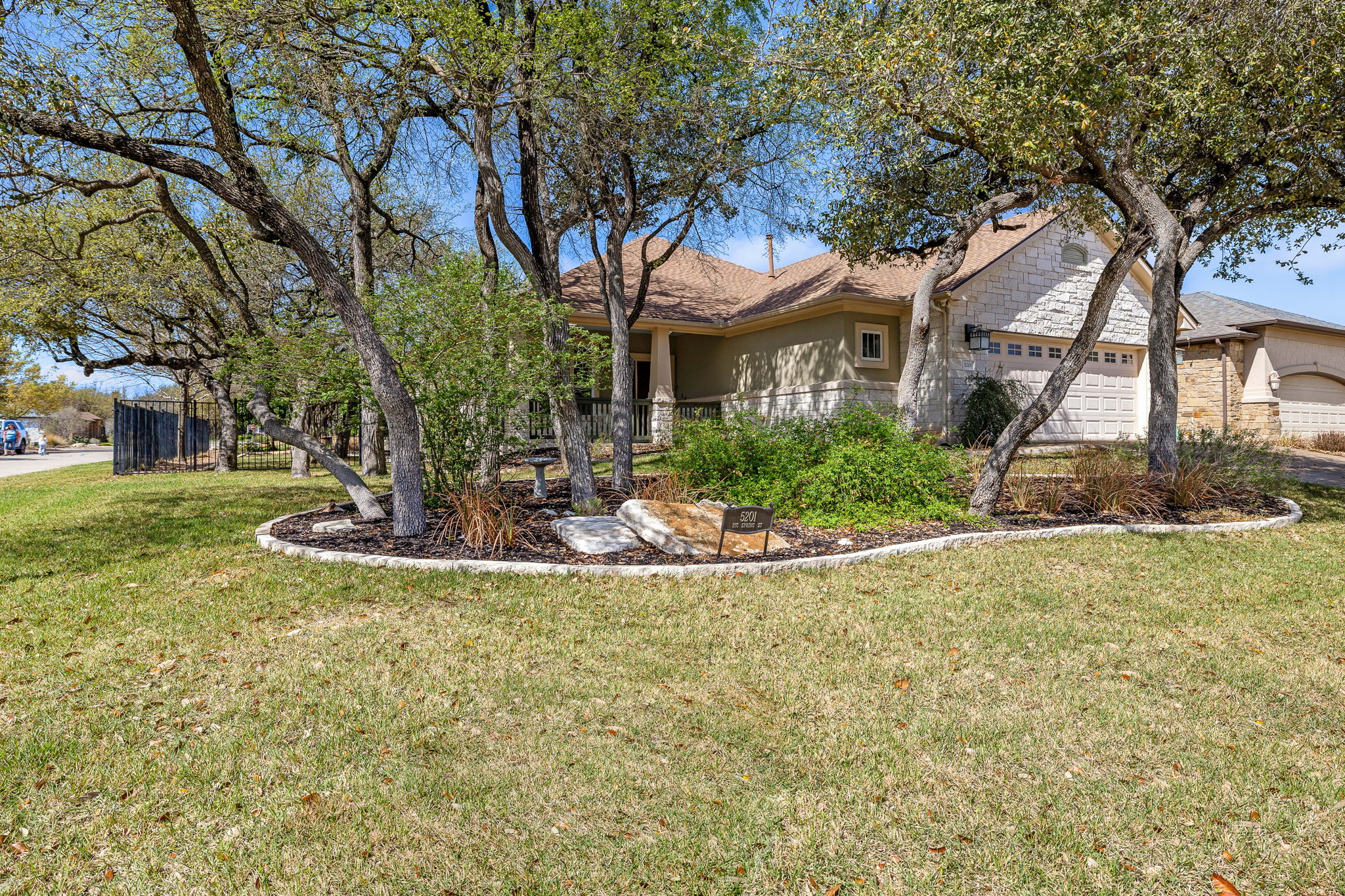 5201 Big Spring Street Georgetown, TX 78633 - Photo 3 of 26 View of front of property with an attached garage and a front yard