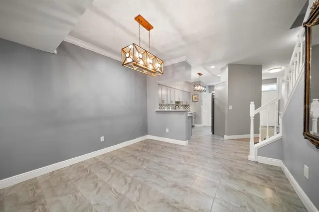 a view of a kitchen with a sink