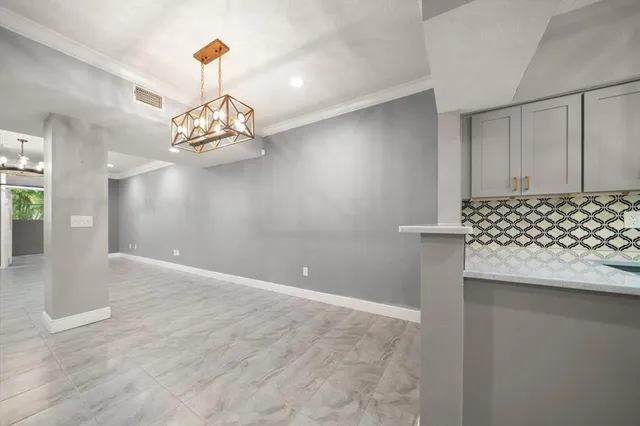 a view of a livingroom with a chandelier
