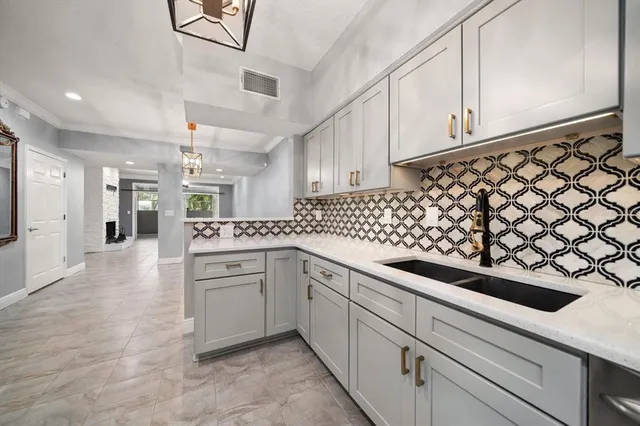 a kitchen with a stove microwave and refrigerator