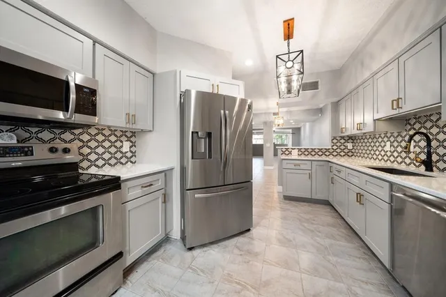 a view of washer and dryer in a utility room