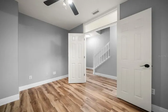 wooden floor in a hall with an entryway