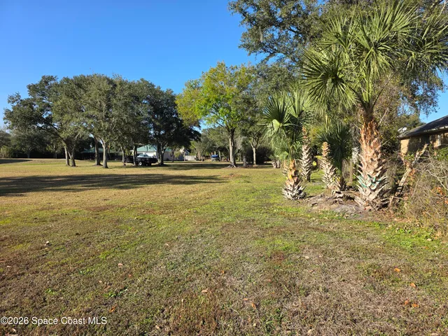 a view of road with trees